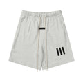 FEAR OF GOD FOG ESSENTIALS Silicone 3‑Stripes Unisex Loose 5‑Inch Sports Shorts